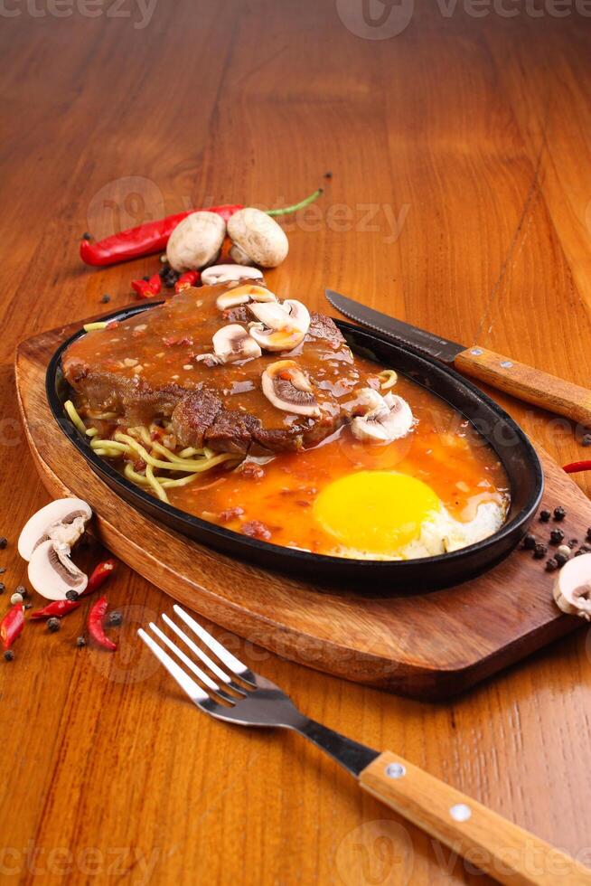 Rib eye steak barbeque sauce with mashroom photo