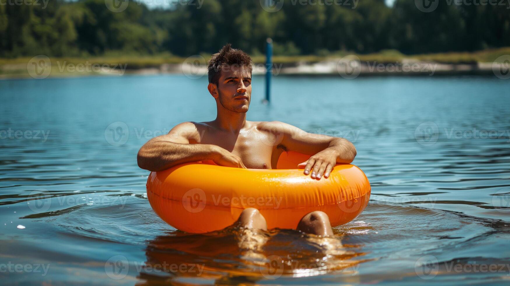 Interesting summer photo of a man with an inflatable ring