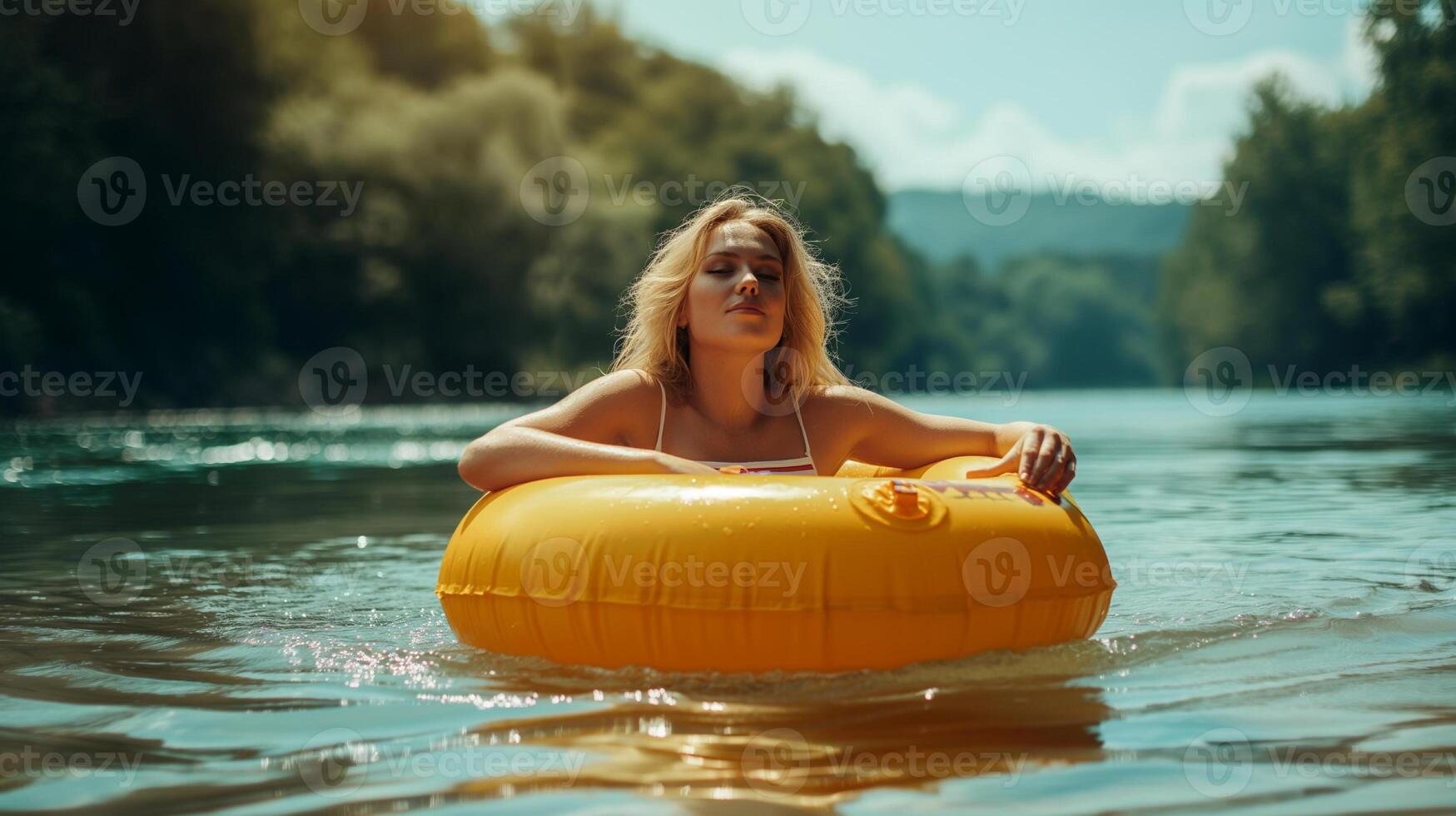 Interesting summer photo of a woman with an inflatable ring