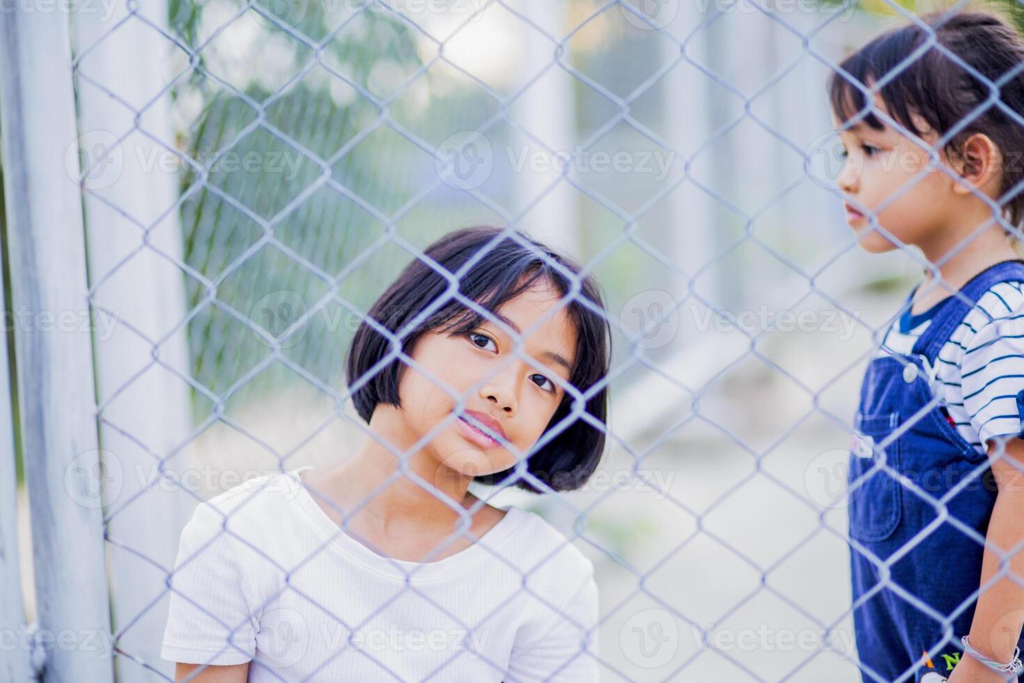 depressed teenager Upset, sad teenagers need help and teenage problems with negative thinking and introversion. photo