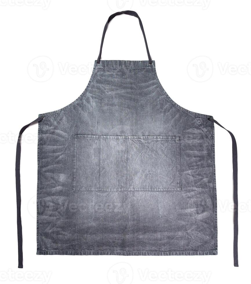 Clean gray denim apron isolated on white photo