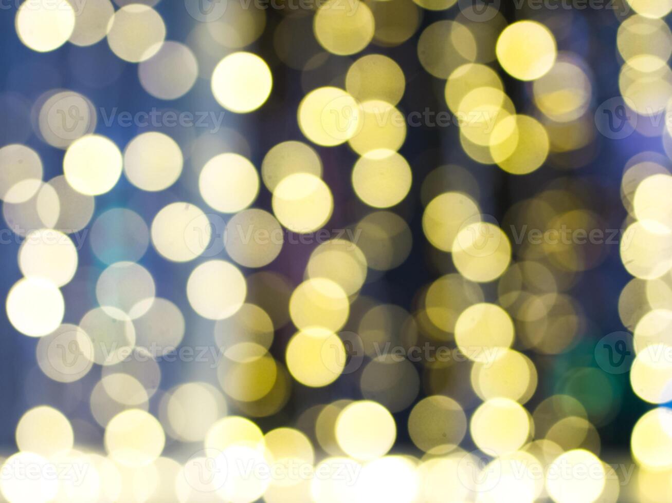 gold abstract background with bokeh defocused lights photo