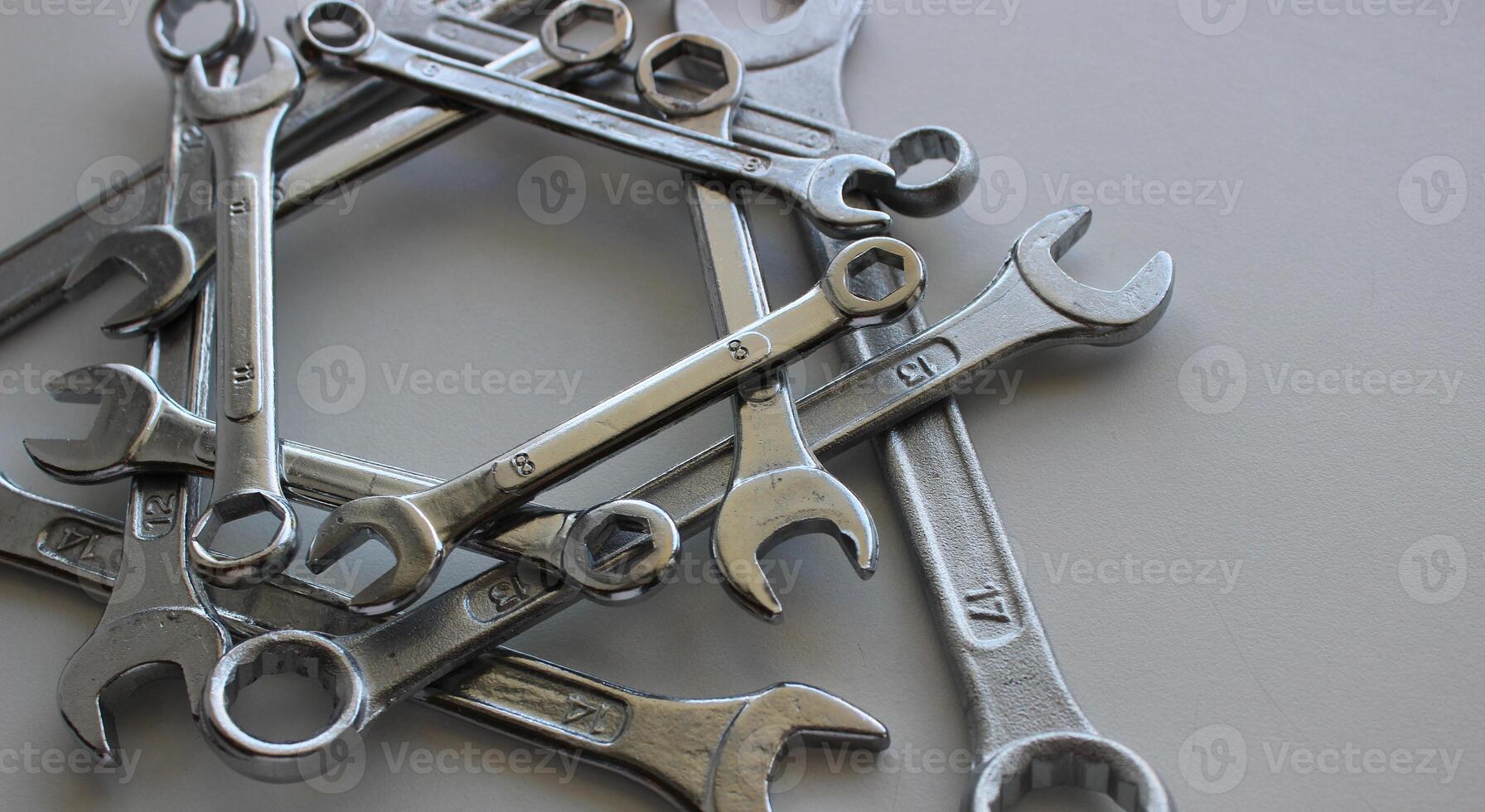 Concept For Logos Or Titles With Order Structure Of Different Chrome Combination Wrenches photo