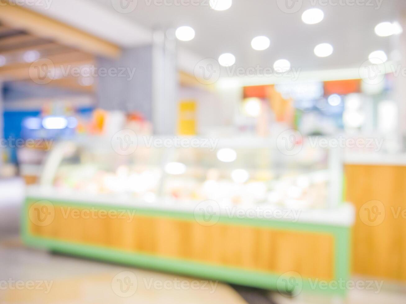blur bakery shop with bokeh as background photo
