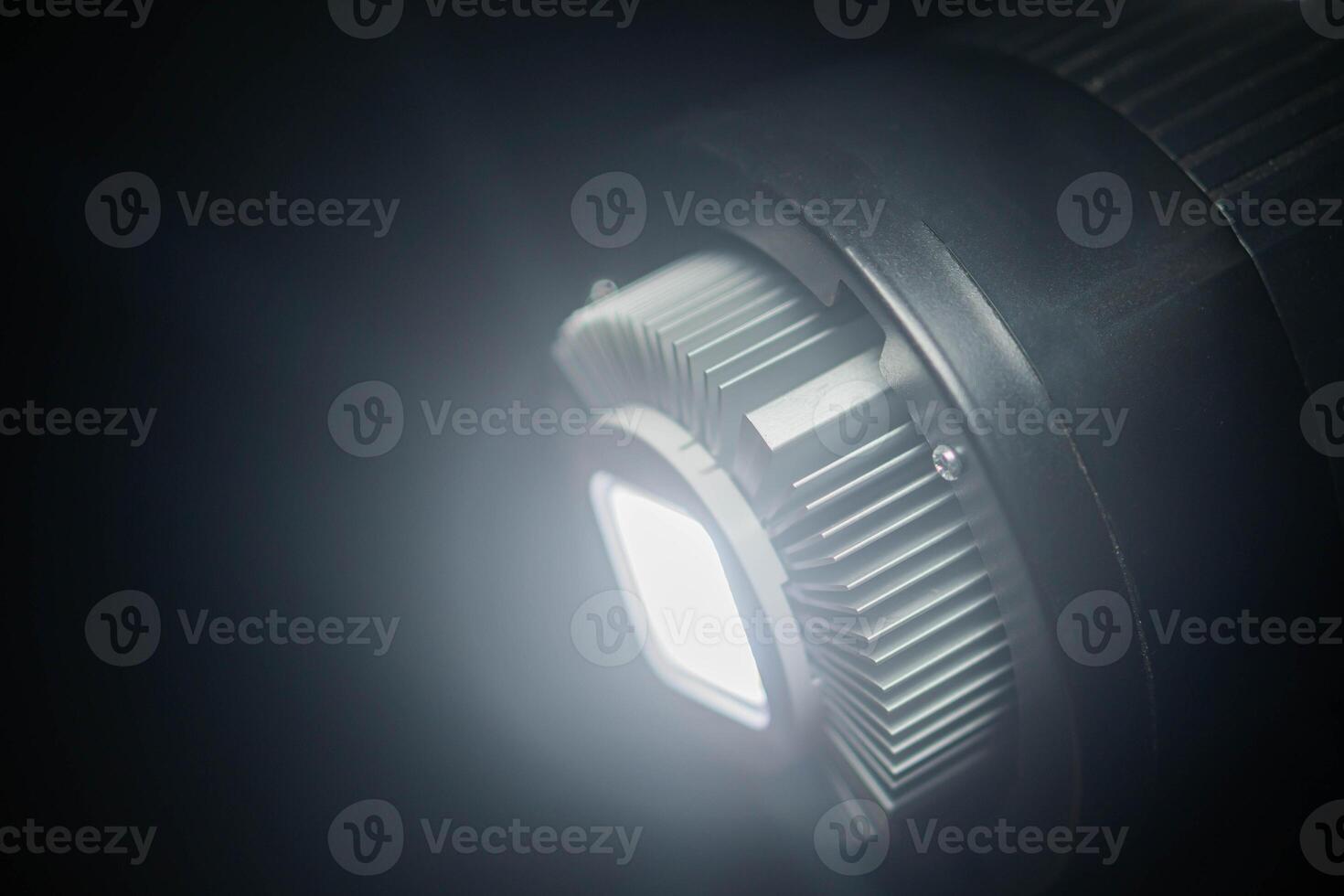 Bright LED light with heat sink in dark environment photo