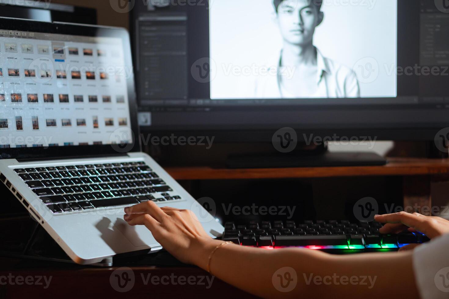Photo editing on laptop and desktop with black and white portrait