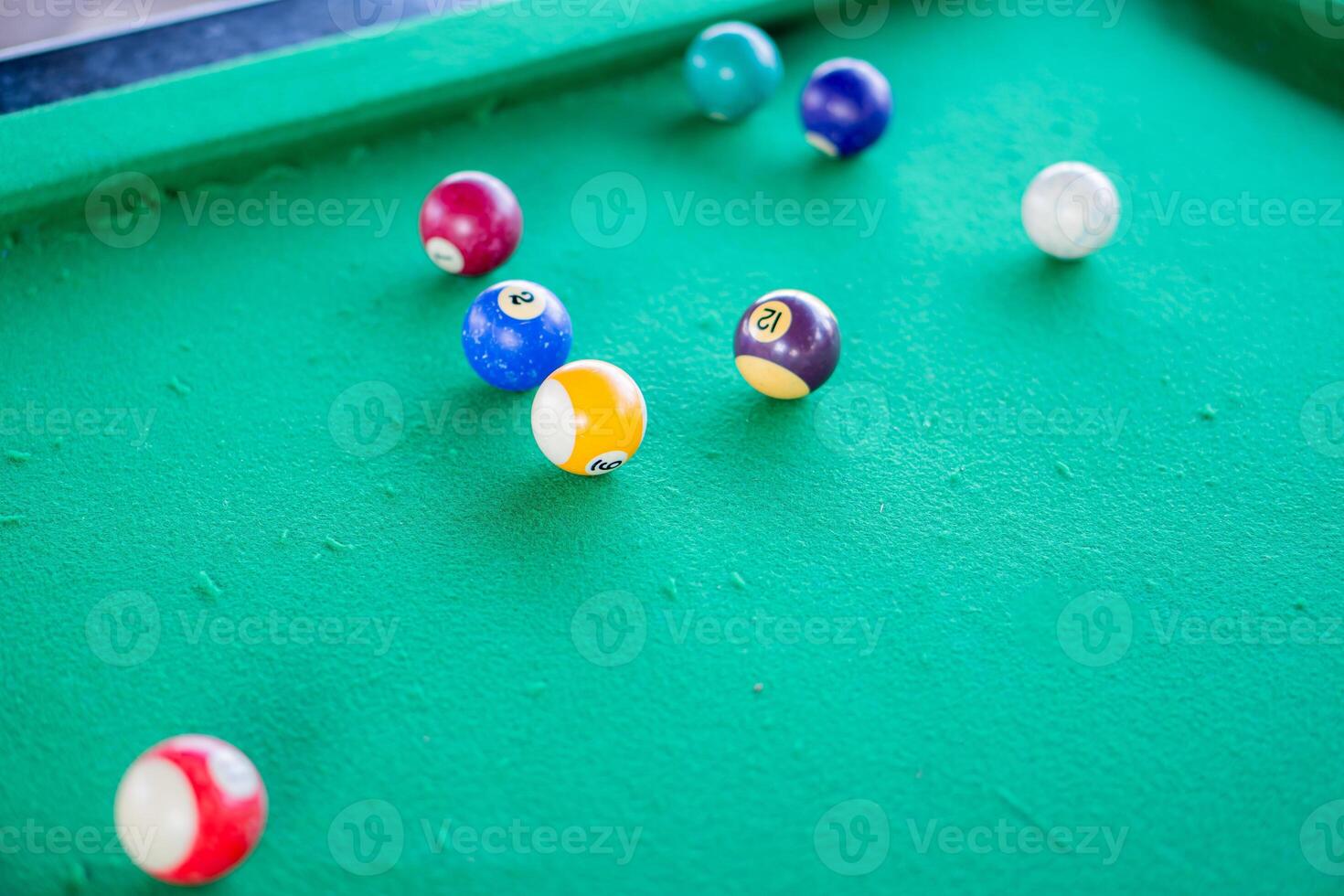 Billiard balls on a pool table photo