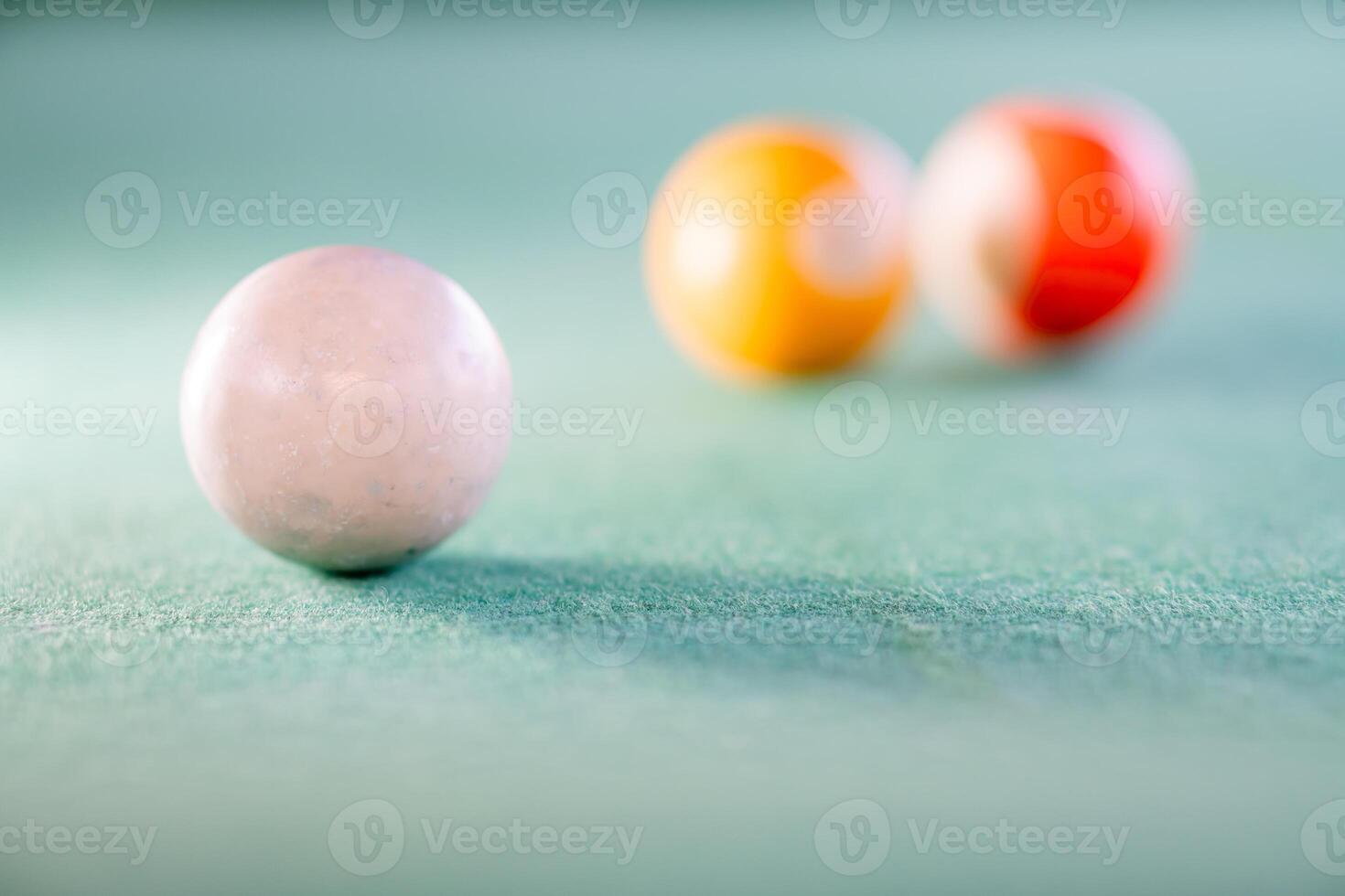 Cue ball on a pool table photo