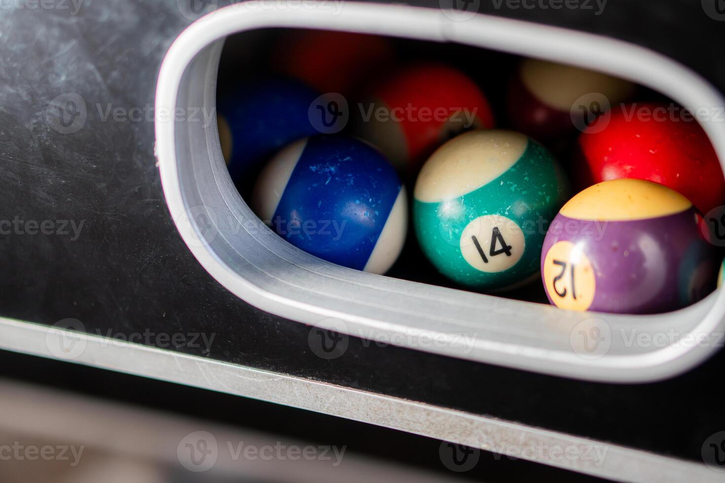 Billiard balls in pool table return system photo