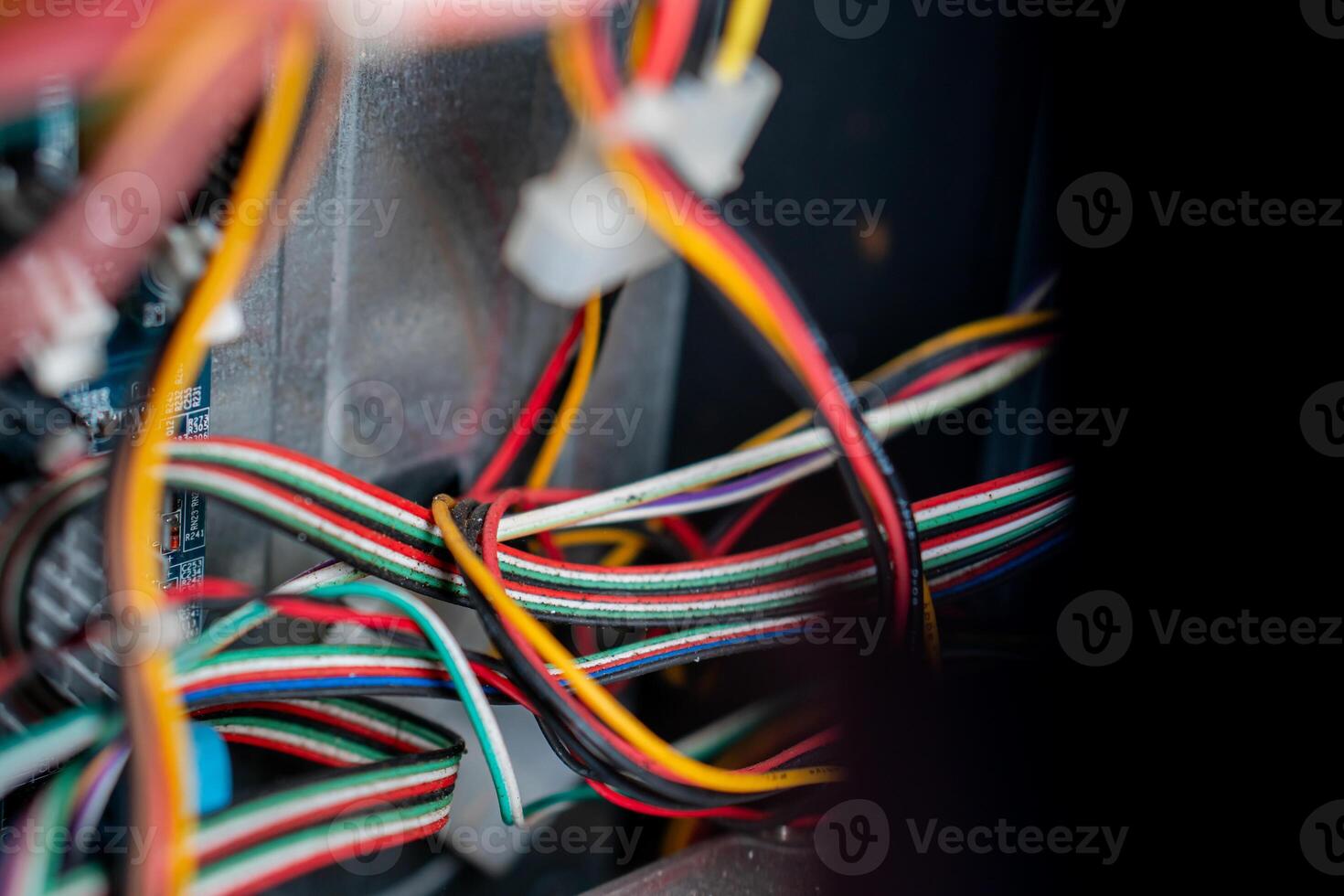 Close-up of electrical wires and connections inside a device photo