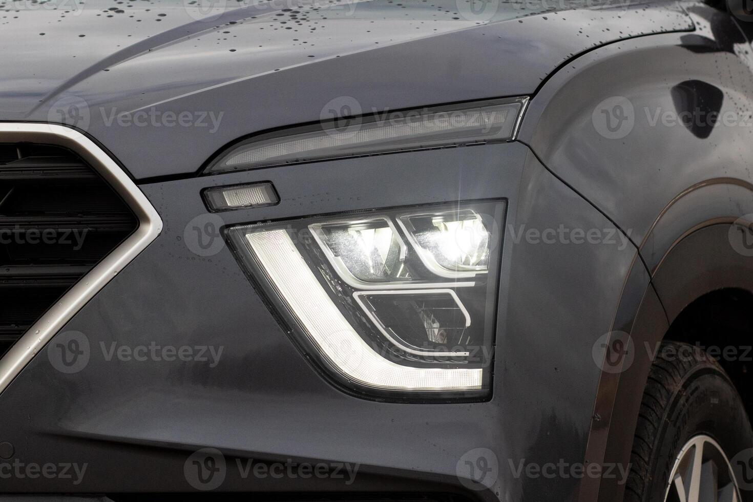 Exterior of a new car. Front LED low beam and high beam headlights photo