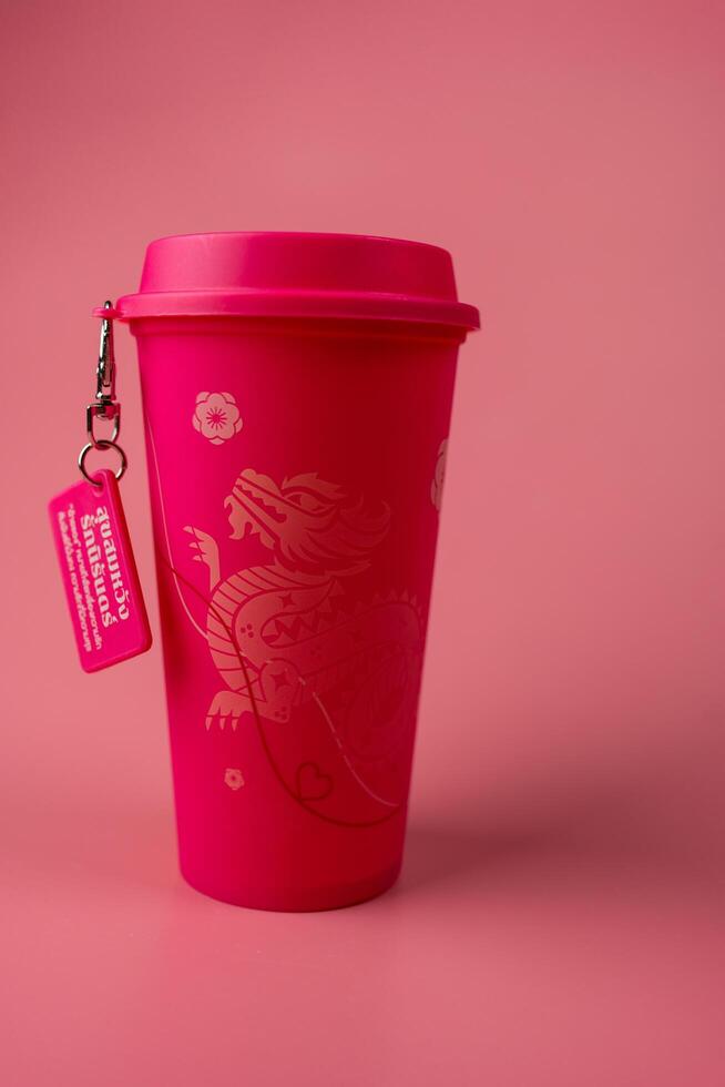 Bangkok, Thailand - July 10, 2024 Pink reusable cup from Cafe Amazon. Get 1 free Dragon Reusable Cup in June 26, 2024 photo