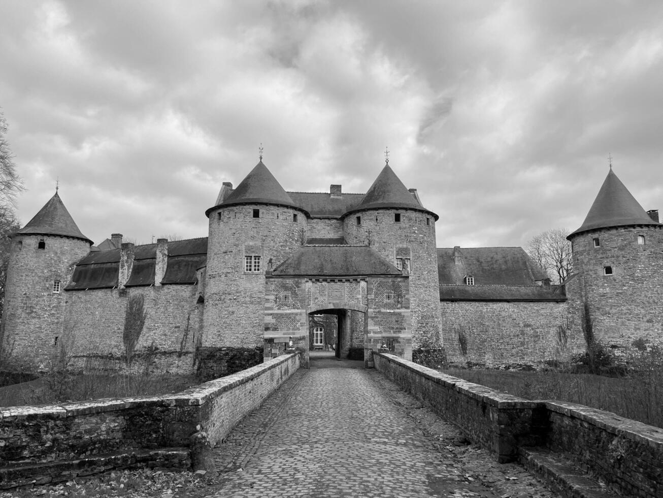 Belgium 02.24.2024 The Castle of Corroy le Chateau is a medieval castle in the province of Namur. Black and white photo