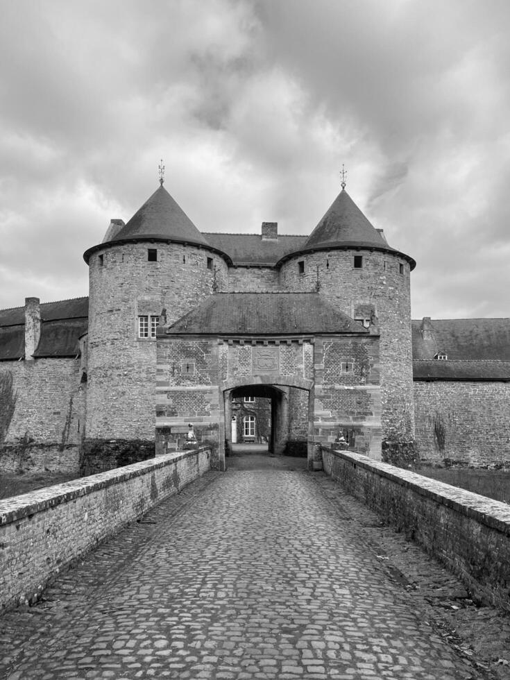 Belgium 02.24.2024 The Castle of Corroy le Chateau is a medieval castle in the province of Namur. Black and white photo