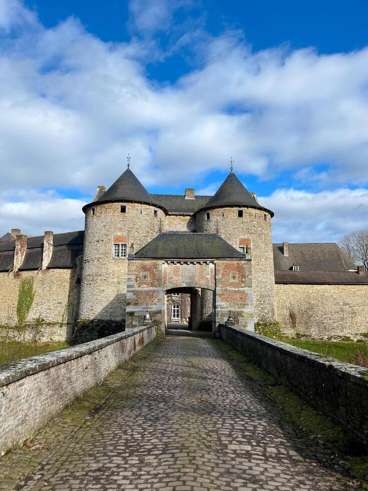 Wallonia, Belgium 02.24.2024 The Castle of Corroy le Chateau is a medieval castle in the province of Namur photo