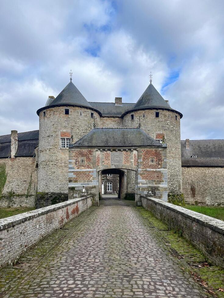 Wallonia, Belgium 02.24.2024 The Castle of Corroy le Chateau is a medieval castle in the province of Namur photo