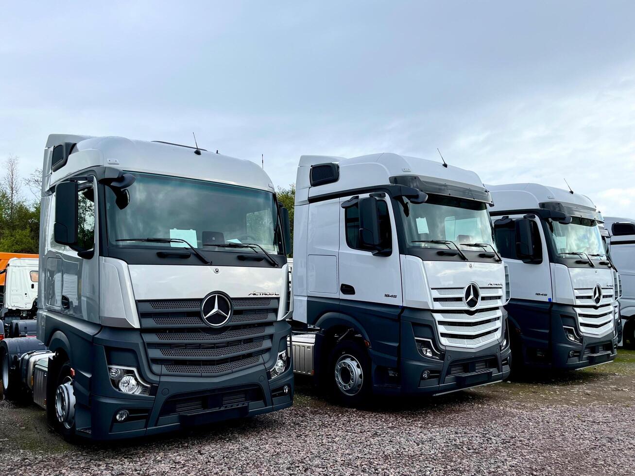 Poznan, Poland 01.03.2023 Warehouse with new Mercedes Actros L stored in the open air photo