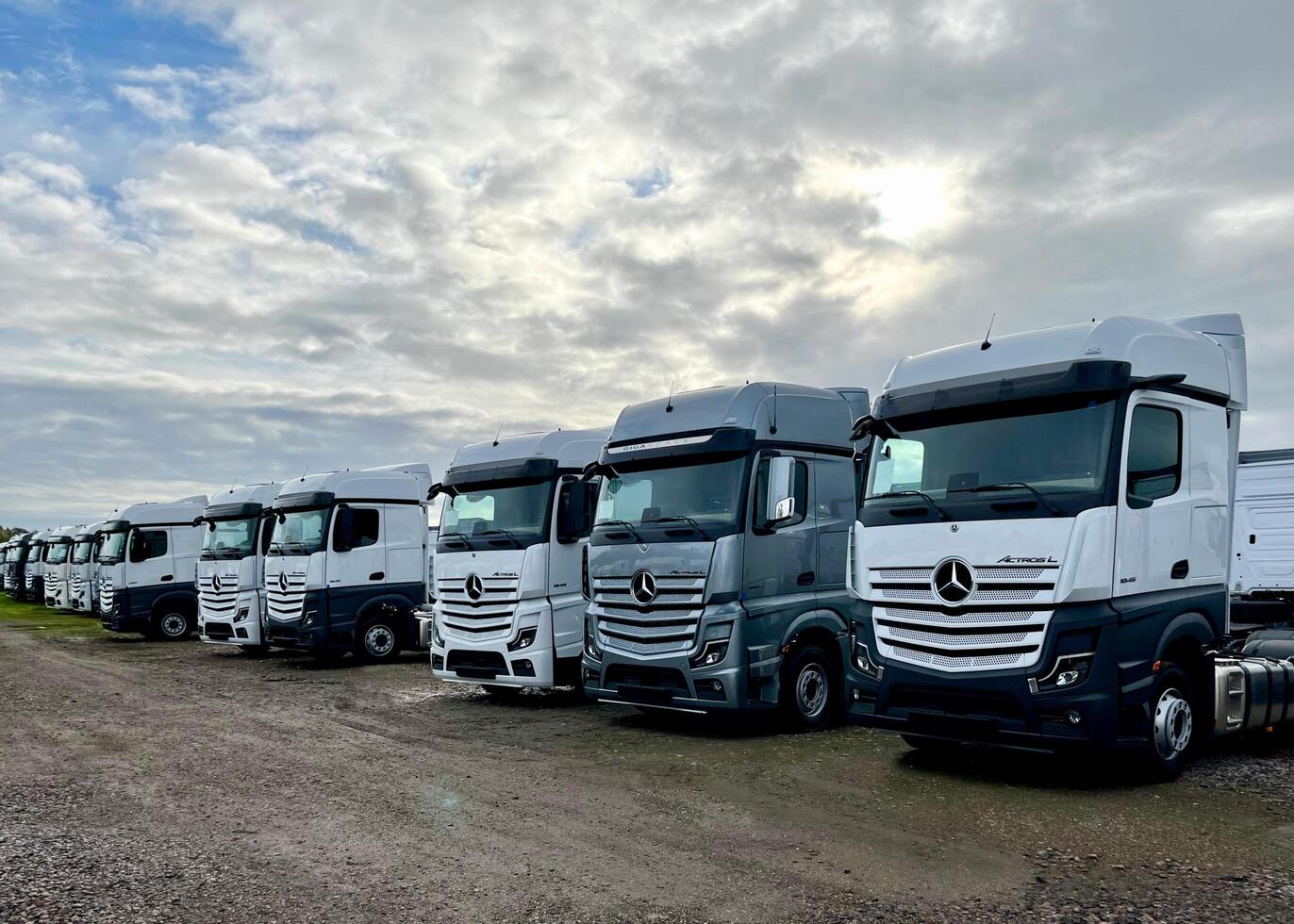 Poznan, Poland 01.03.2023 Warehouse with new Mercedes Actros L stored in the open air photo