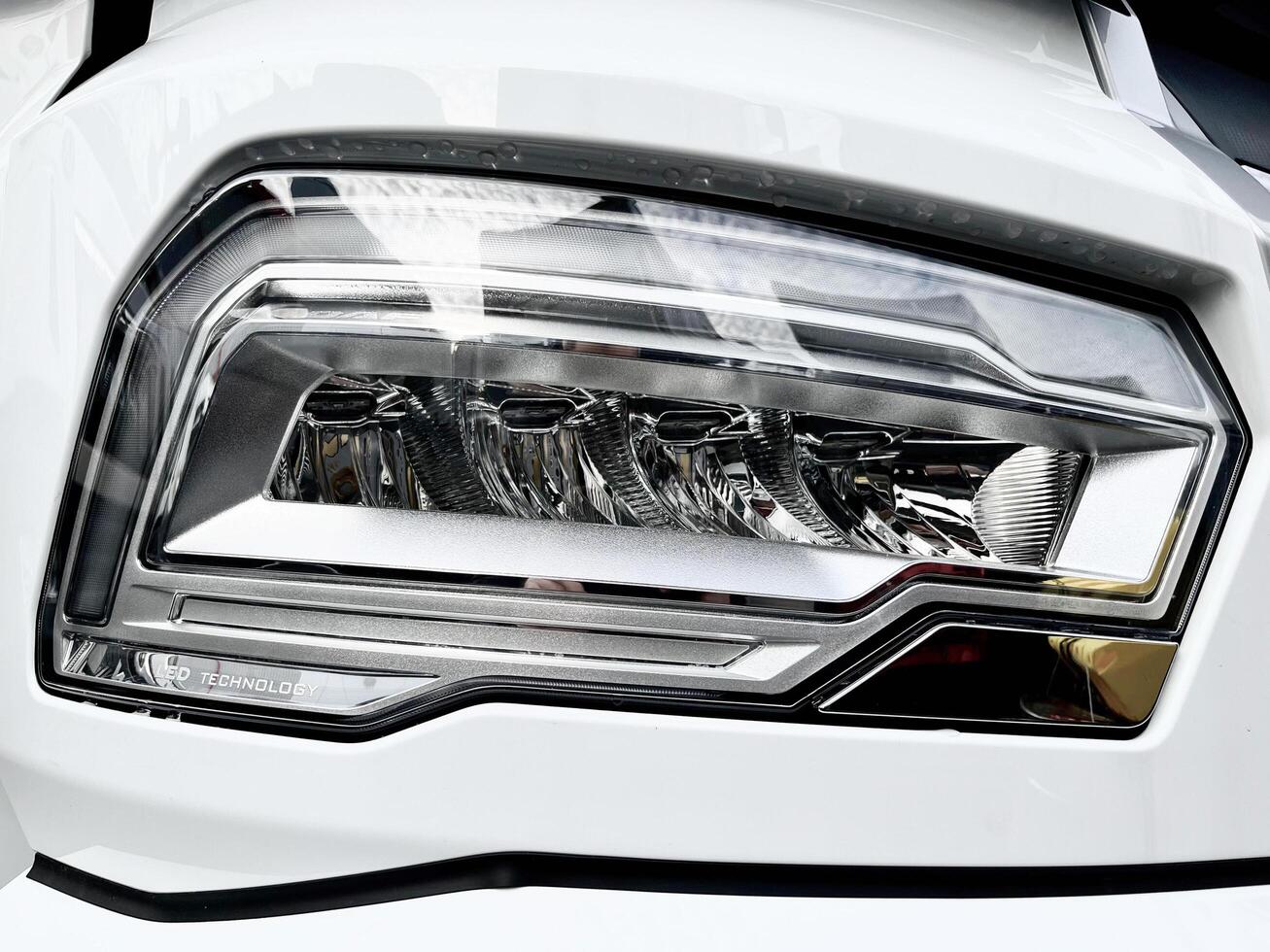 Poznan, Poland - 01.03.2023 Appearance of a new car. Front LED low beam and high beam headlights of the new DAF XF truck photo
