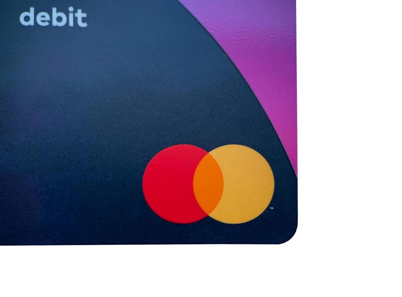 Poznan, Poland - 10.26.2022 Mastercard bank card for payments on white isolated background photo