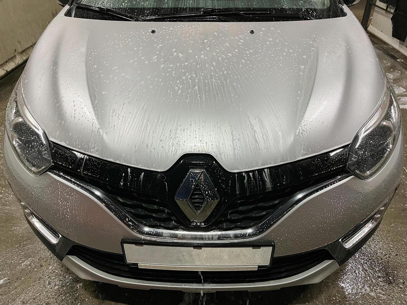 Grodno, Belarus - 01.16.2022 Renault car wash at self-service car wash photo