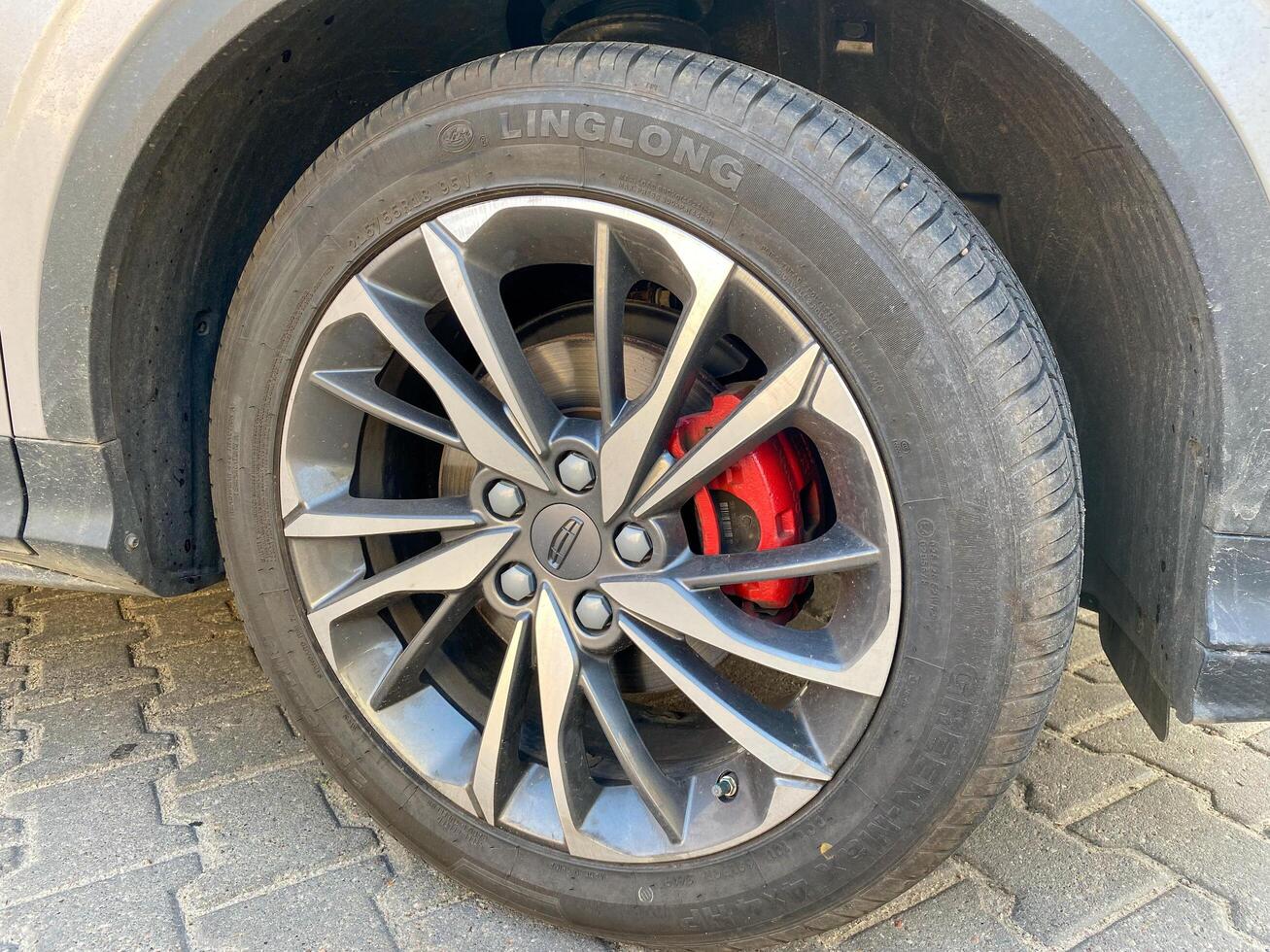 Beijing, China - 05.16.2021 LingLong tire on Geely car disk close-up photo