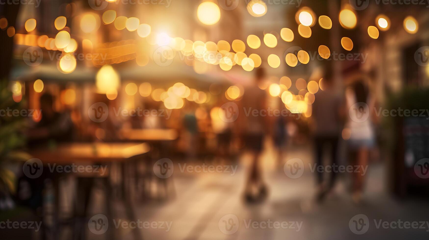 lively outdoor gathering with warm glowing lights, bokeh effect, social event at twilight photo