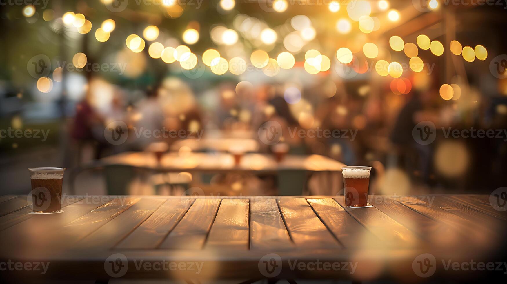 lively outdoor gathering with warm glowing lights, bokeh effect, social event at twilight photo