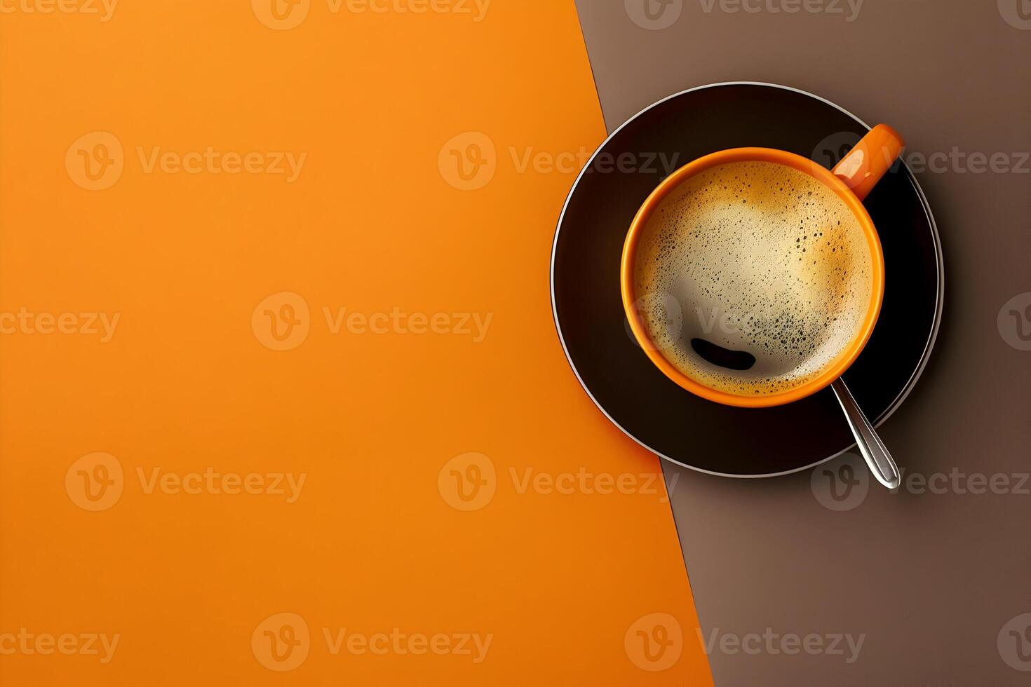 Flat lay of a coffee cup on a brown and orange background, space for copy or design photo