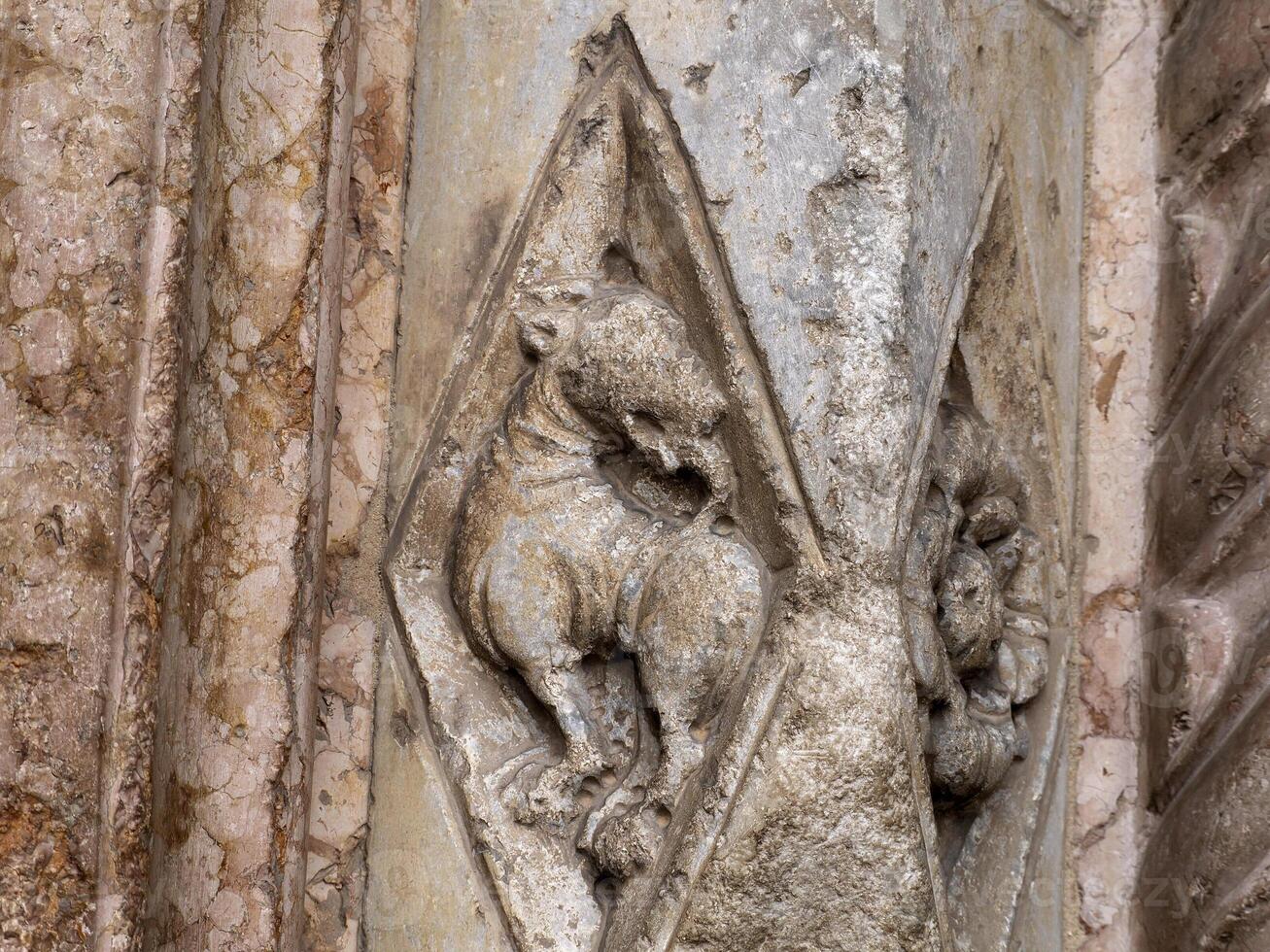Verona dome cathedral church exterior sculptures detail. Romanesque sculpture attributed to the workshop of Veronese sculptor Brioloto photo