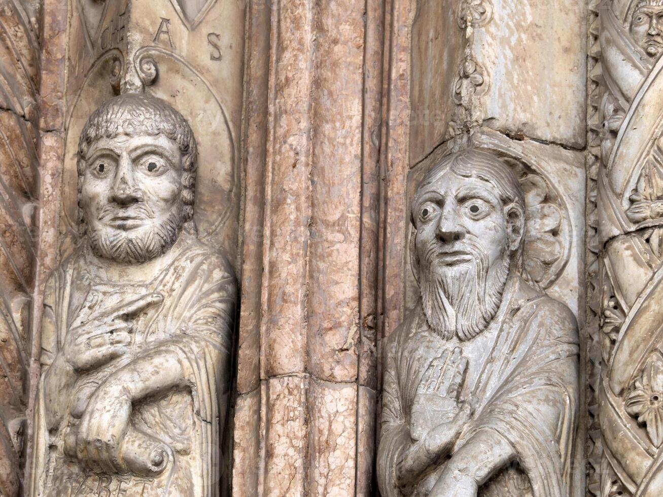 Verona dome cathedral church exterior sculptures detail. Romanesque sculpture attributed to the workshop of Veronese sculptor Brioloto photo