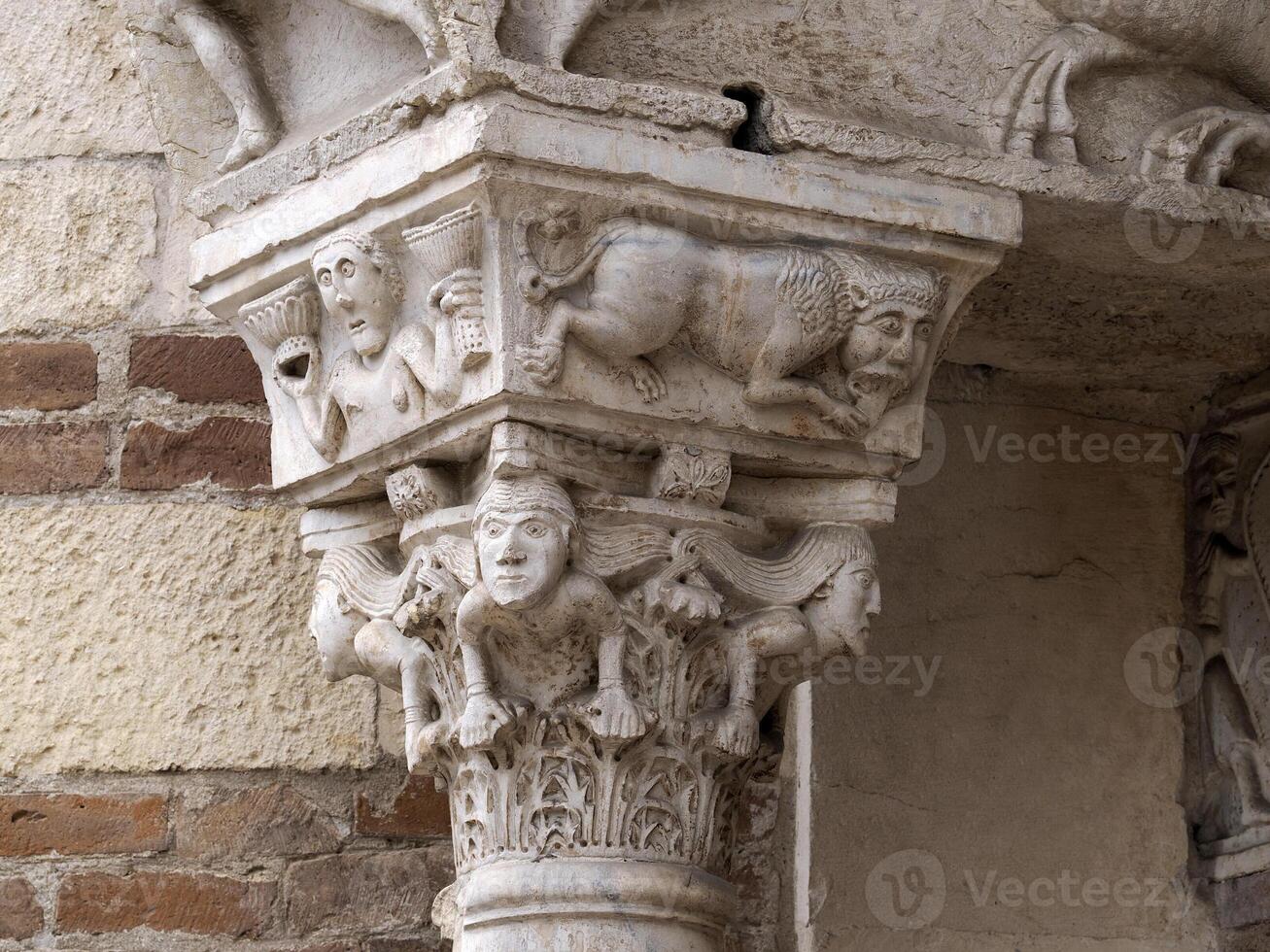 Verona dome cathedral church exterior sculptures detail. Romanesque sculpture attributed to the workshop of Veronese sculptor Brioloto photo