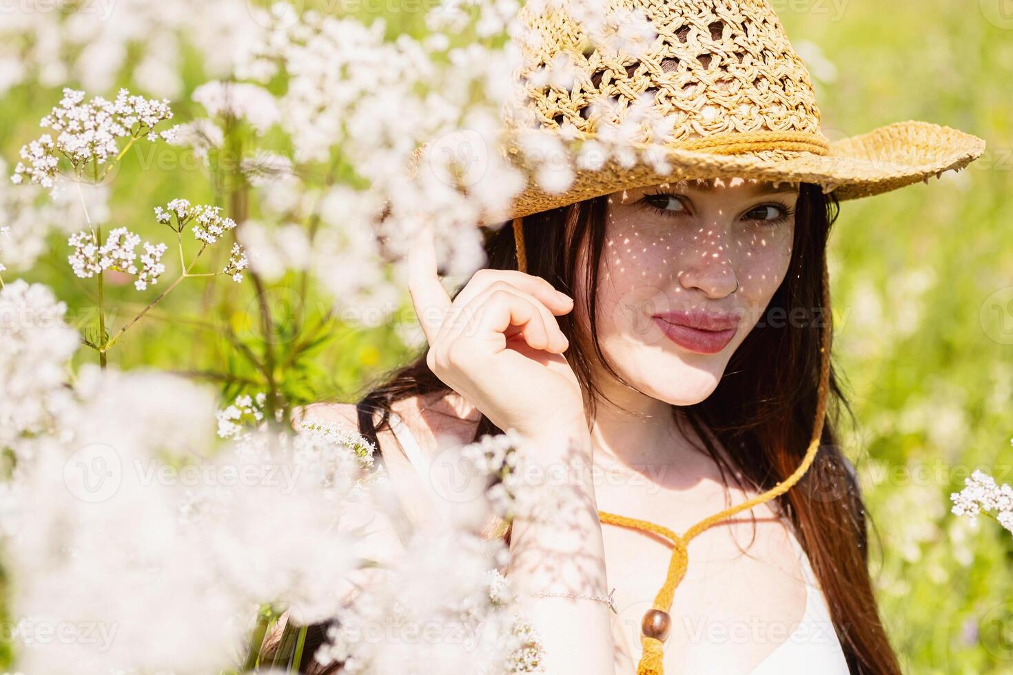 Summer portrait of woman enjoying nature. photo
