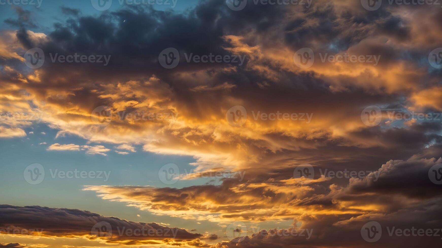 Colorful clouds in a dramatic sky at sunset. photo