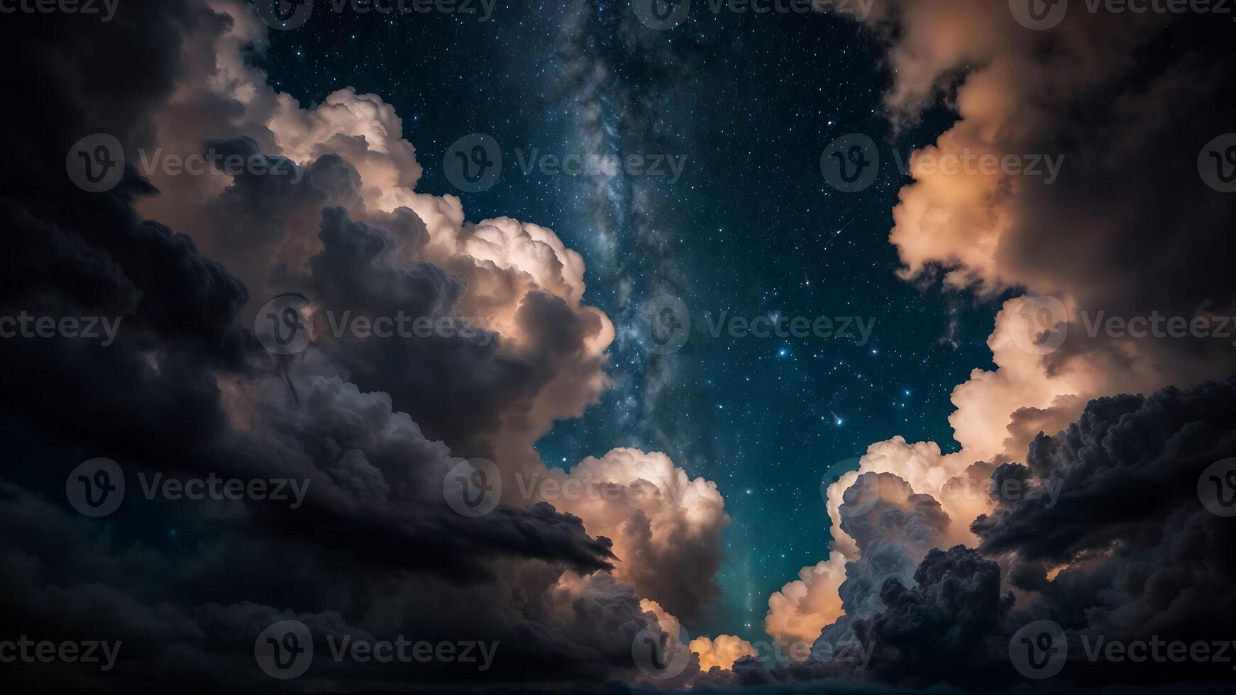 A night time sky with stars and the milky way behind some dramatic clouds. photo