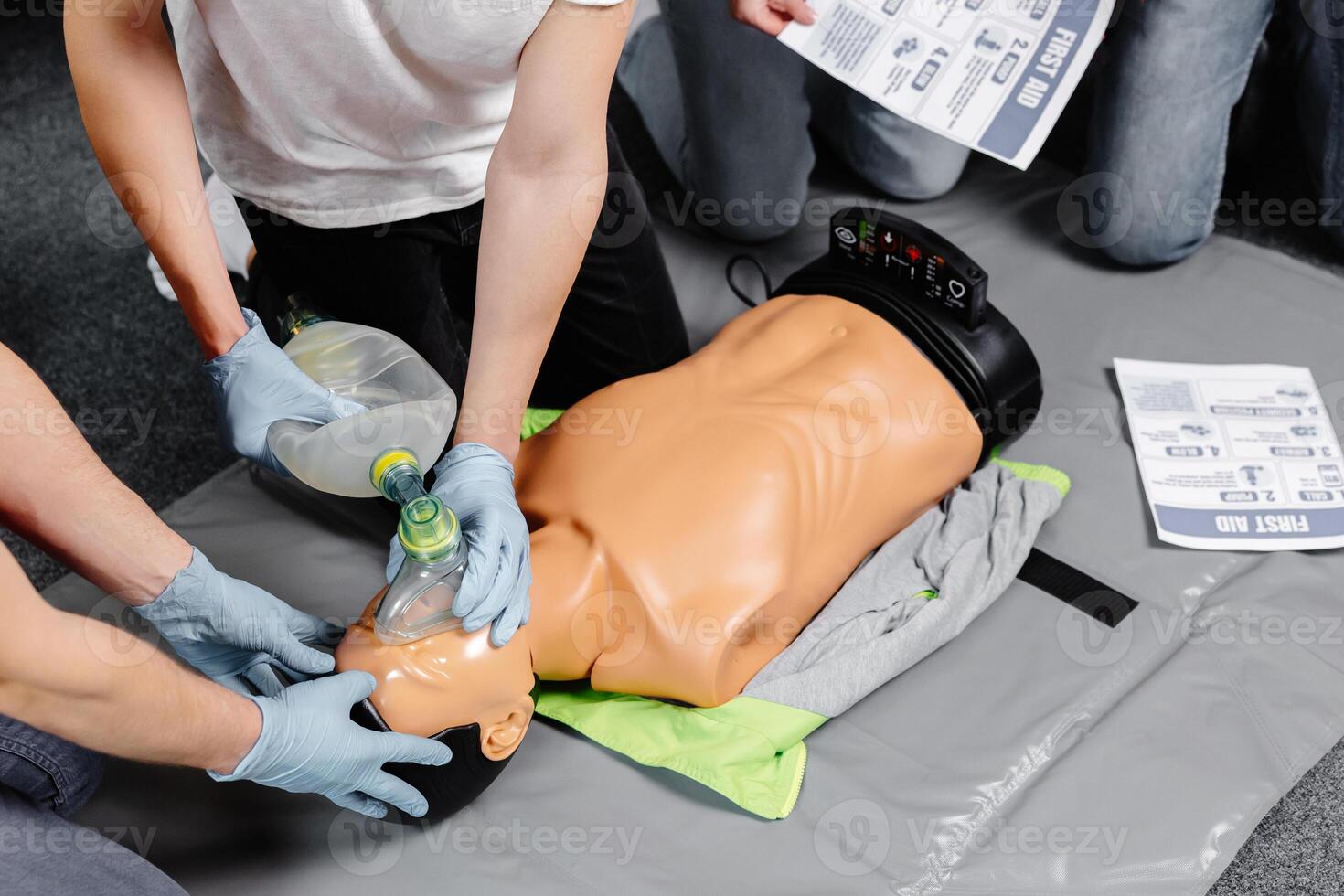 First Aid Training - Cardiopulmonary resuscitation. First aid course on cpr dummy. photo