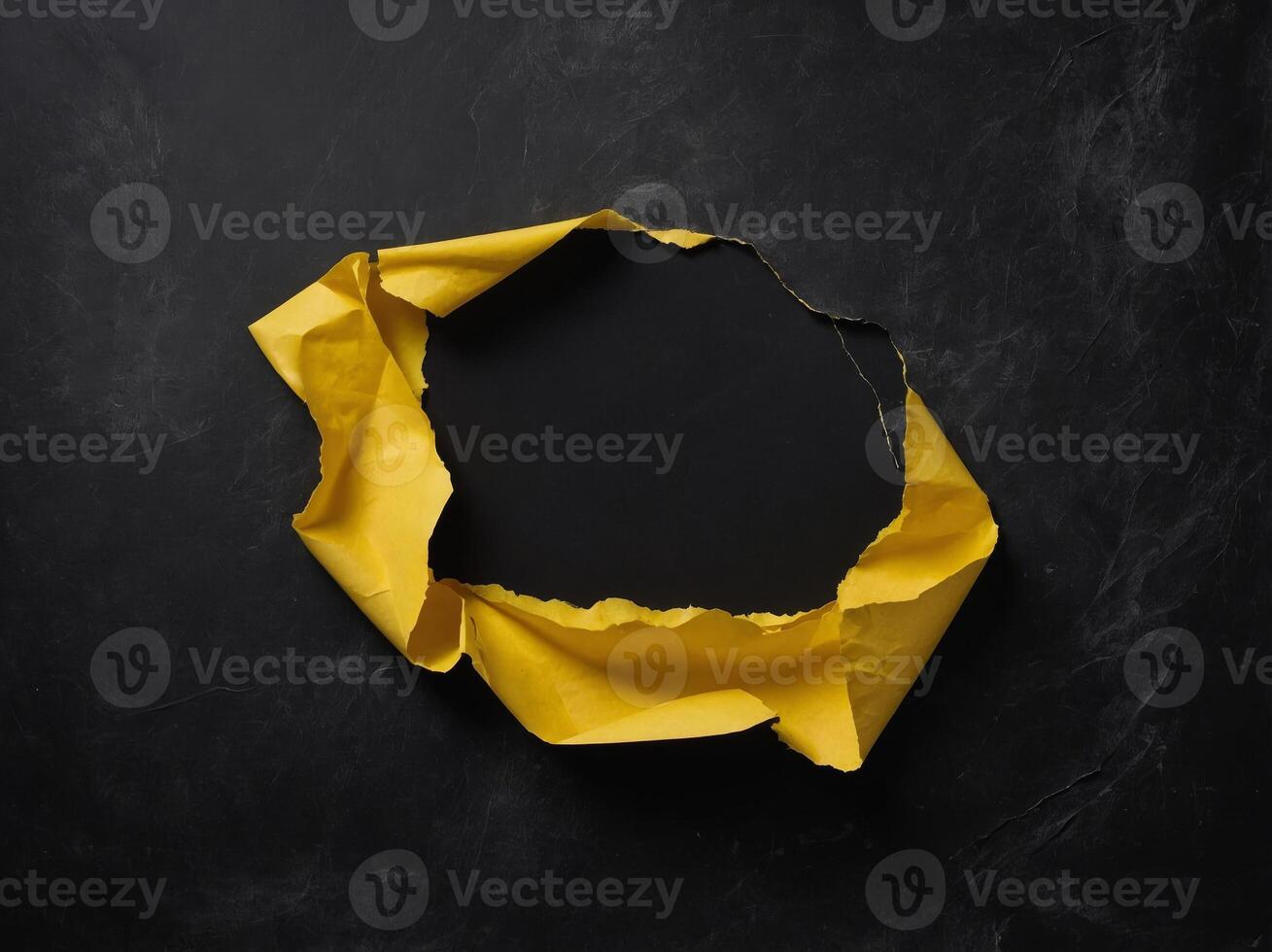 Top view of yellow torn paper on blackboard background Black Friday composition. photo