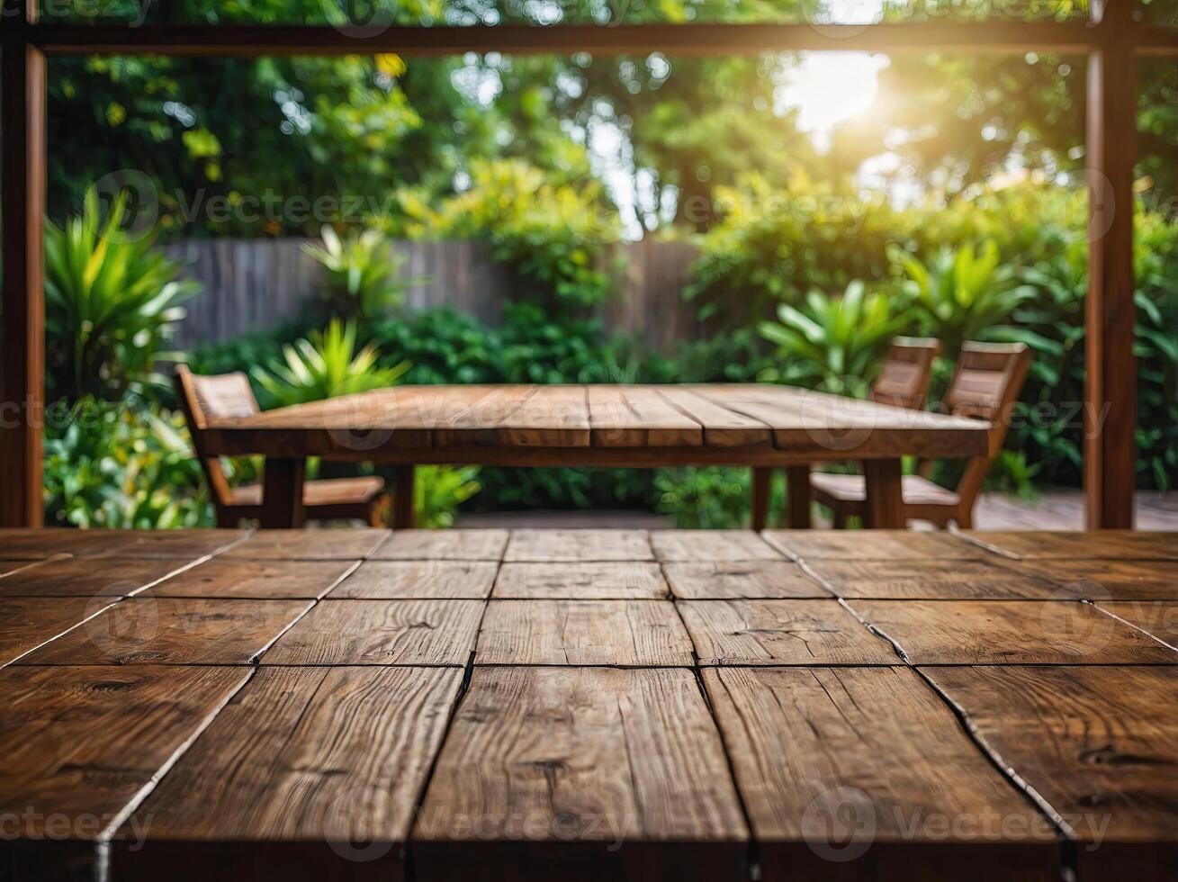 wooden table space with green home backyard view blur background for advertising template. photo