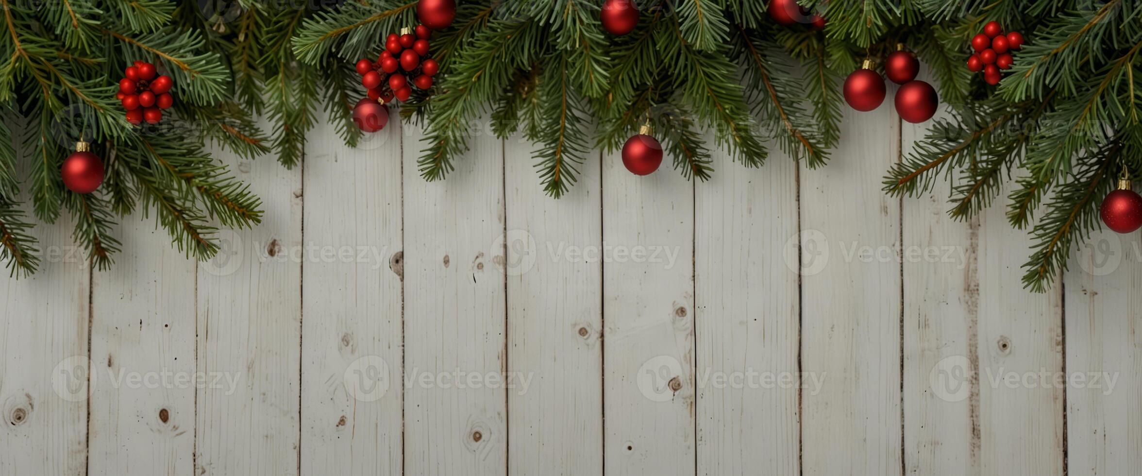 Christmas background pine leaves decoration on white wood plank, frame border design Merry Christmas and New Year holiday background top view. photo
