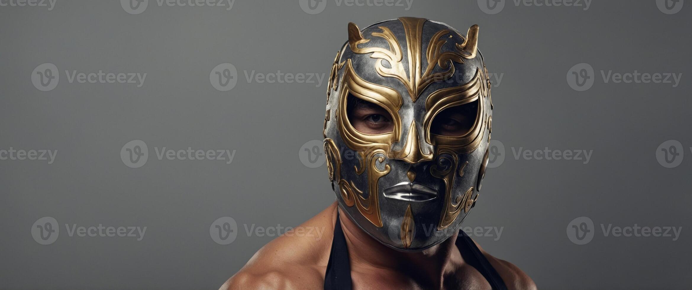 Luchador in mask on gray background Lucha Libre wrestling mask Cinco De Mayo holiday, celebration Mexican culture concept Design for banner, header with copy space. photo