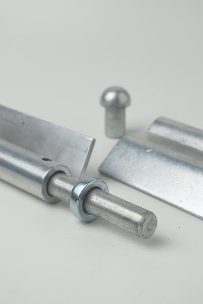 Portrait photo of fireproof iron hinges with a white background