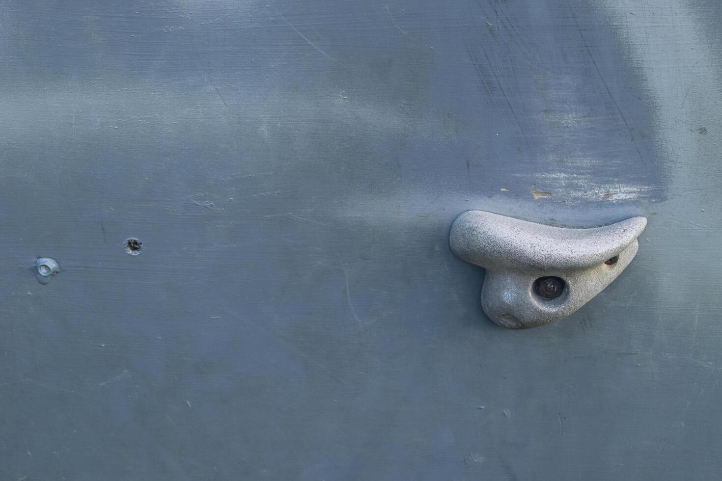 Several colorful climbing steps on a climbing board photo