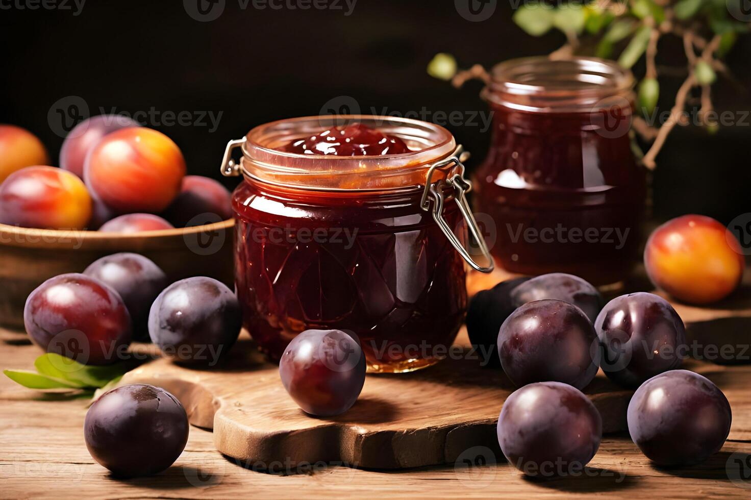 Plum jam, marmalade and fresh plums on a wooden table photo