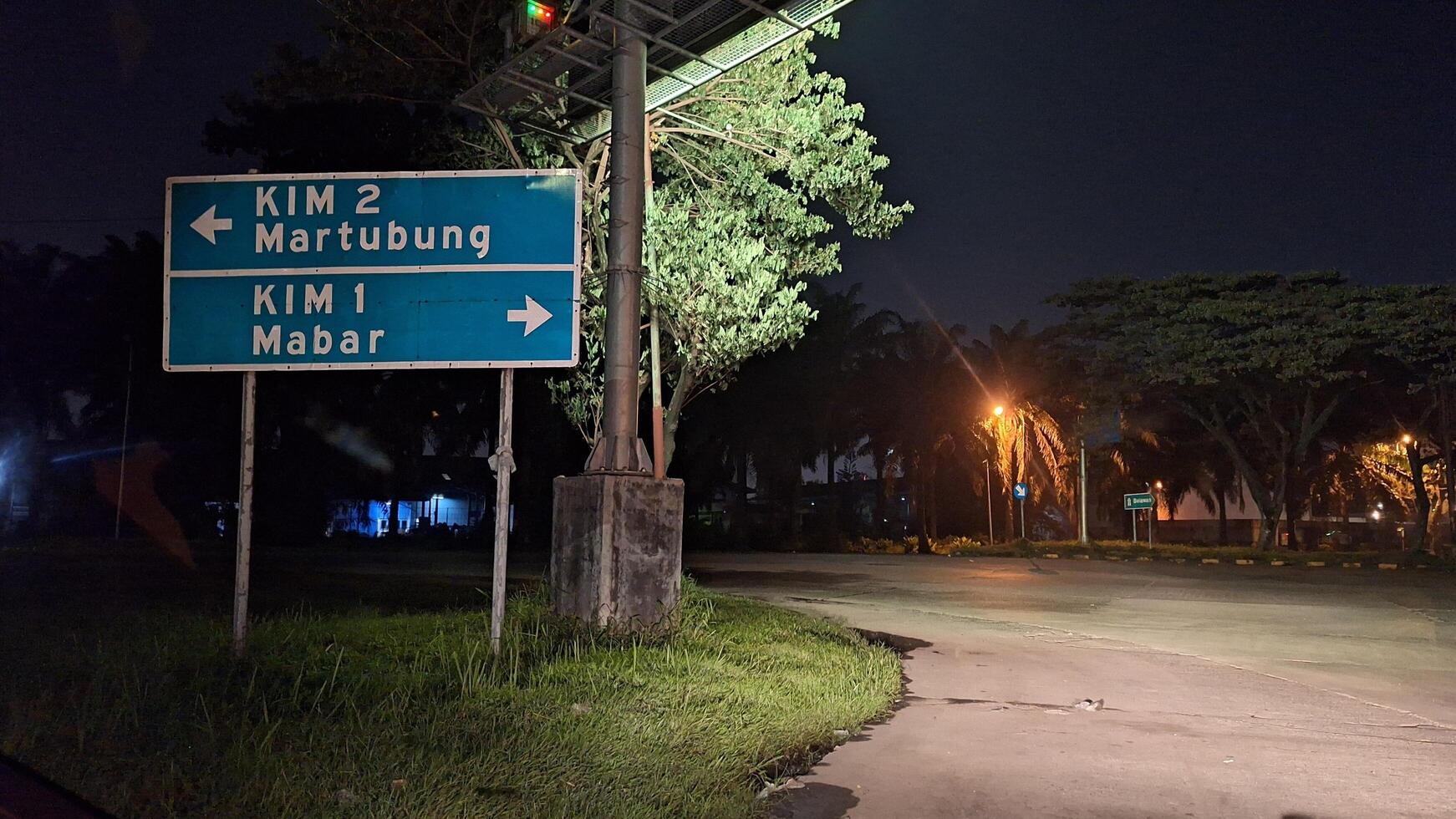 Medan, North Sumatera, Indonesia - Oct 16 2023. Directional sign at the exit of the Mabar Belmera toll road in Medan North Sumatra photo