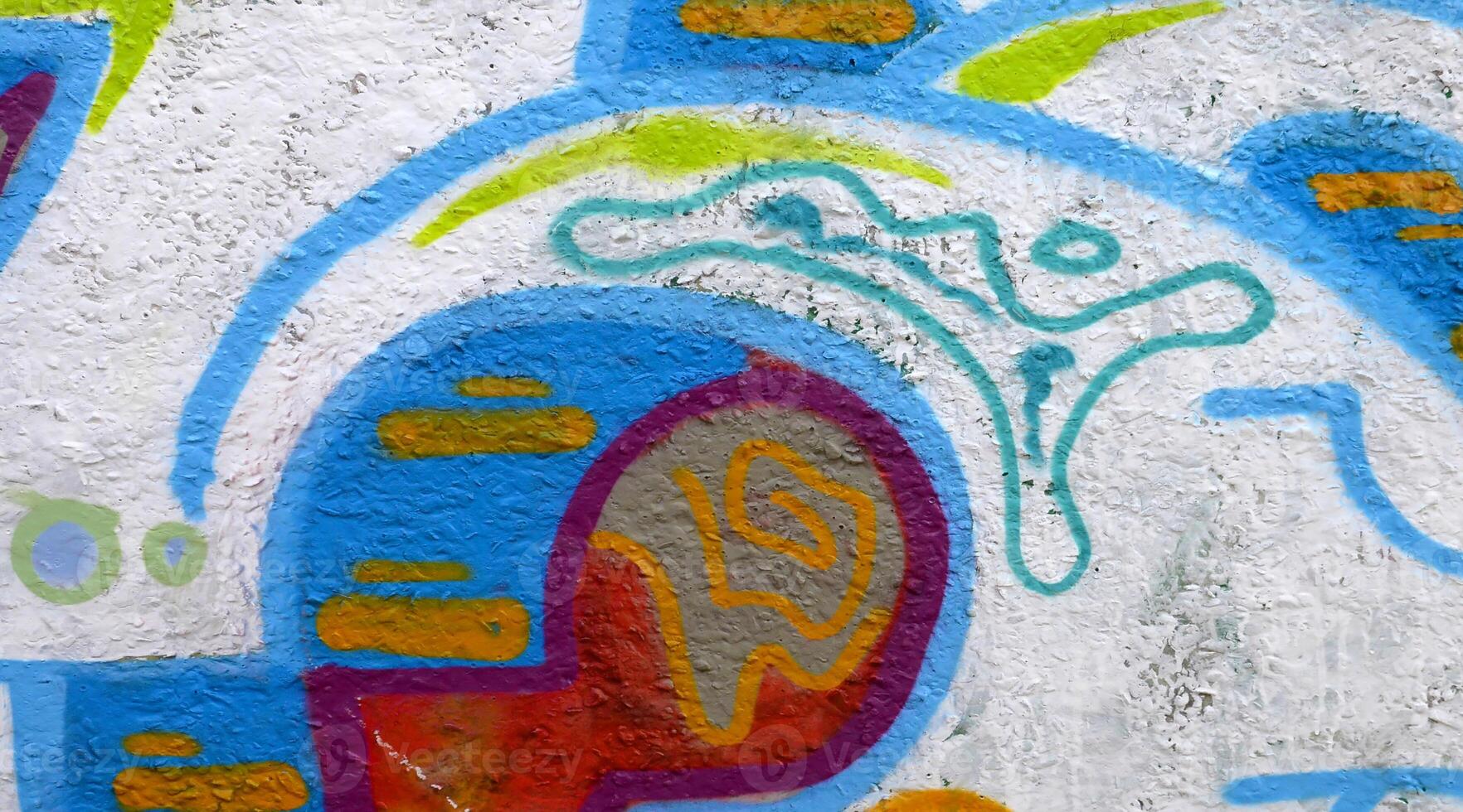 Colorful background of graffiti painting artwork with bright aerosol outlines on wall. Old school street art piece made with aerosol spray paint cans. Contemporary youth culture photo