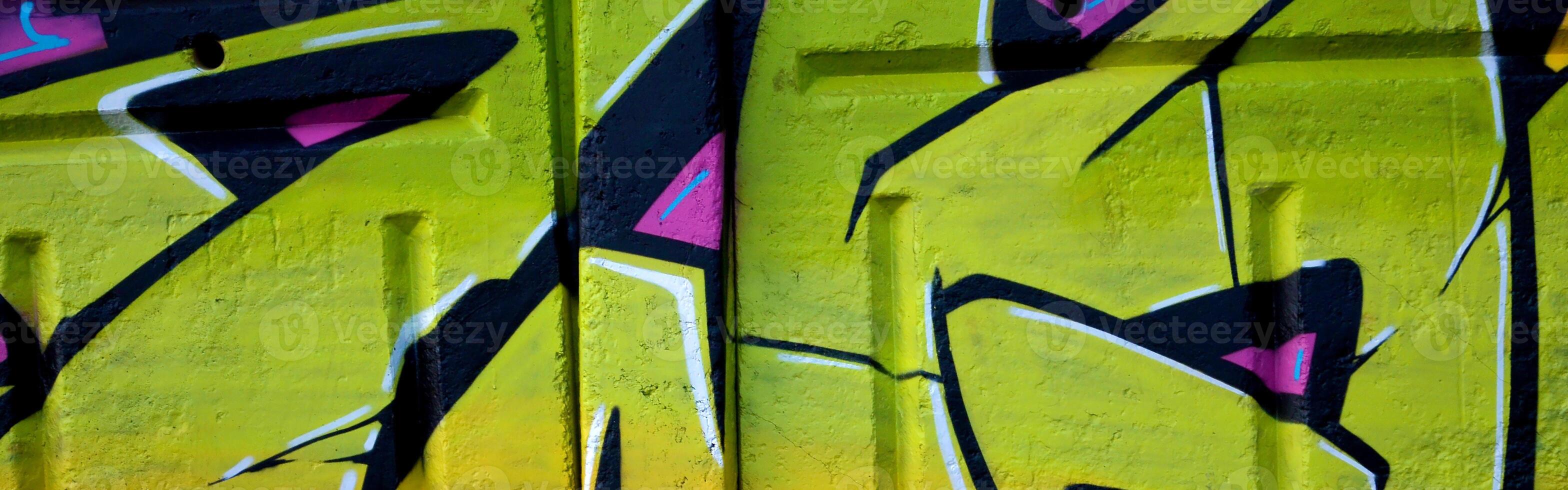 Colorful background of graffiti painting artwork with bright aerosol outlines on wall. Old school street art piece made with aerosol spray paint cans. Contemporary youth culture photo