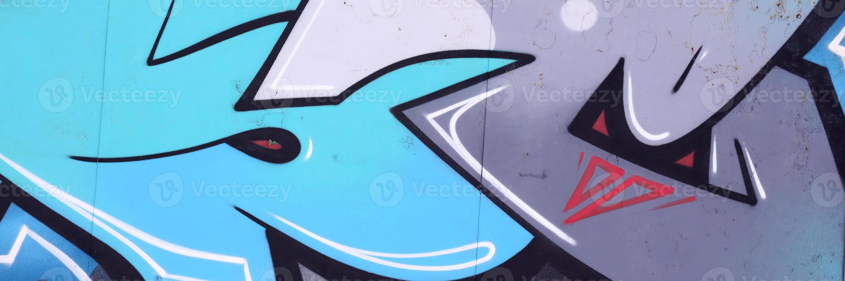 Colorful background of graffiti painting artwork with bright aerosol outlines on wall. Old school street art piece made with aerosol spray paint cans. Contemporary youth culture photo