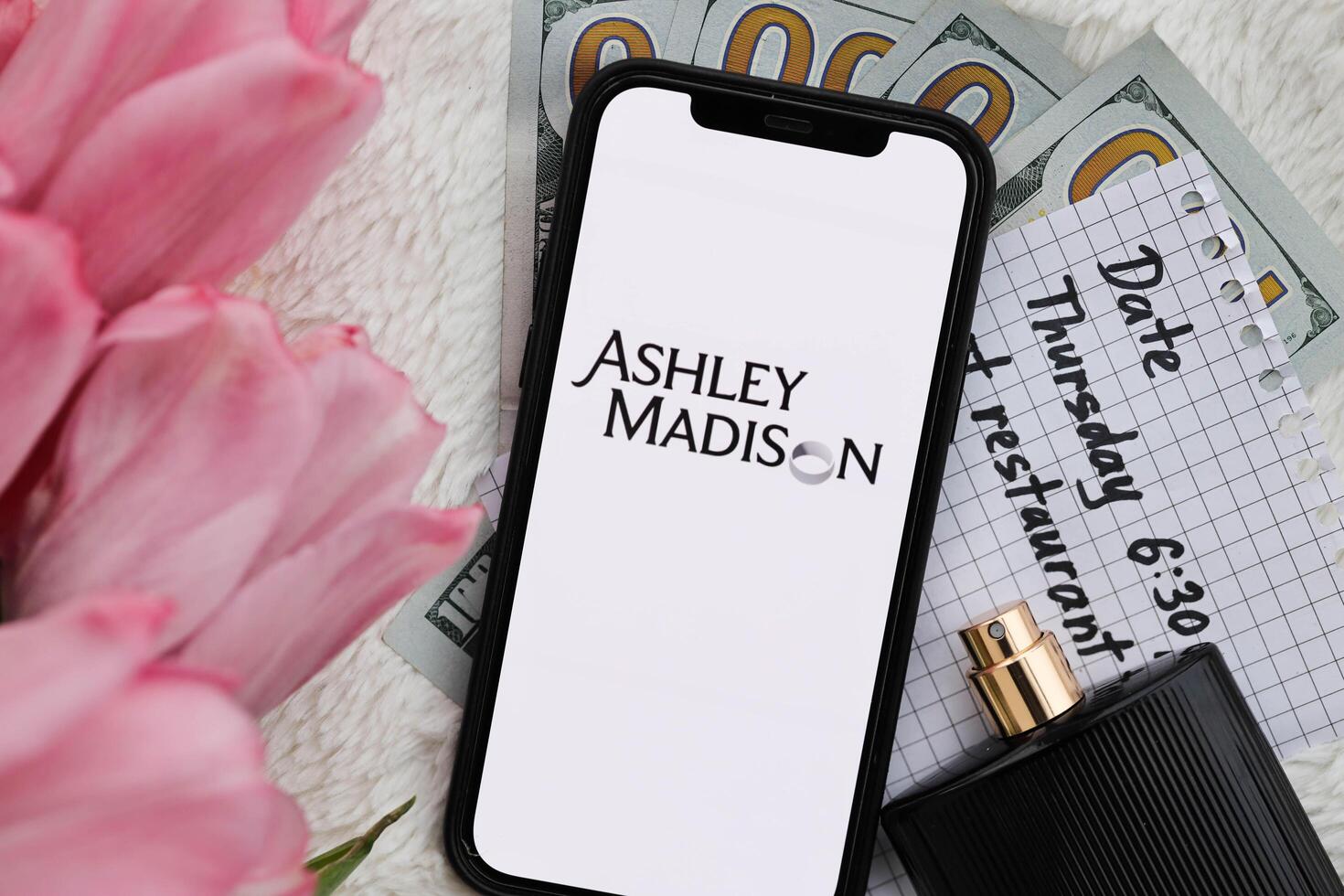 KYIV, UKRAINE - FEBRUARY 23, 2024 Ashley Madison logo of famous dating website or app on iPhone display photo