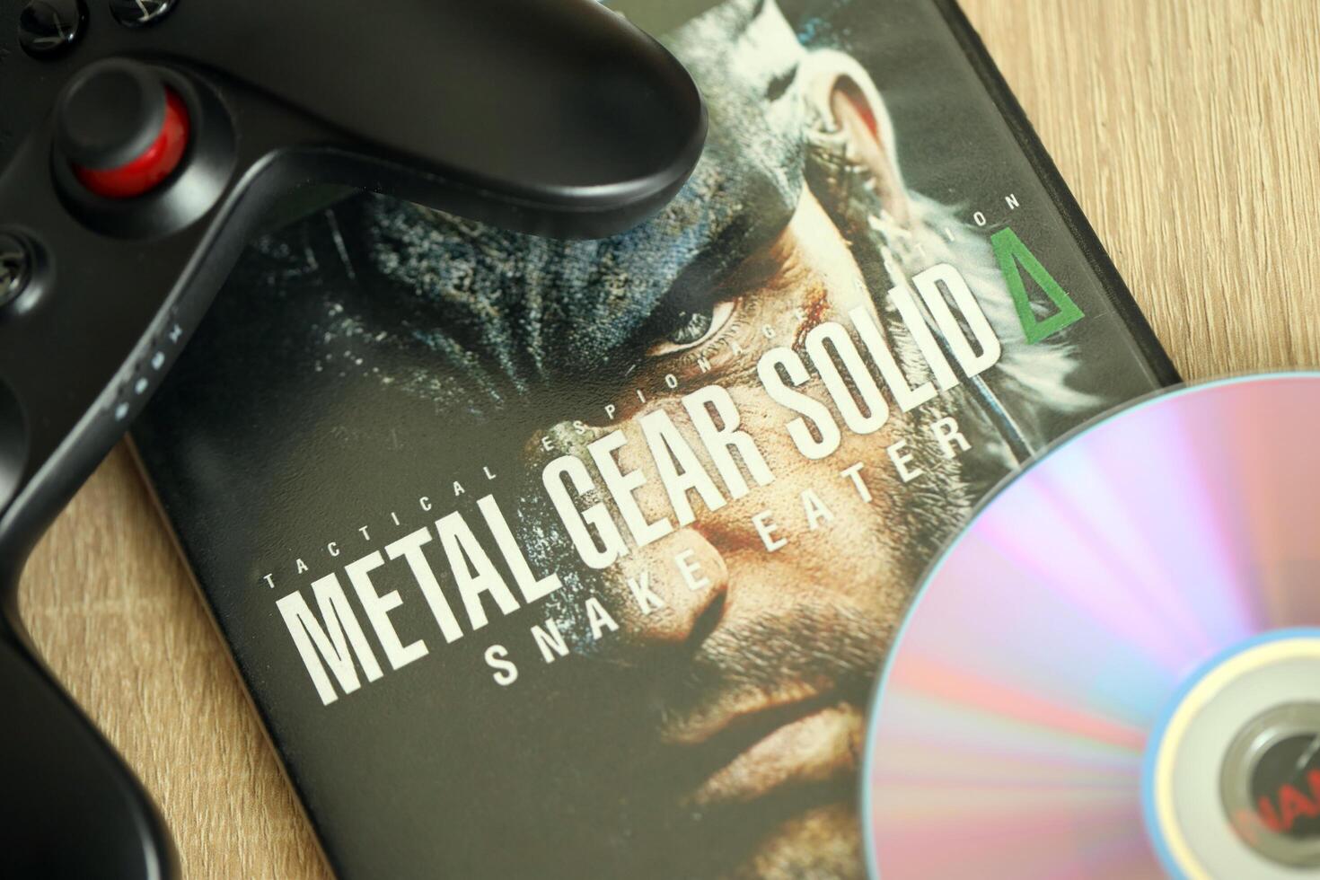 KYIV, UKRAINE - JUNE 26, 2024 Metal Gear Solid Delta Snake Eater PS5 game disc box for console gaming. Popular game disc photo
