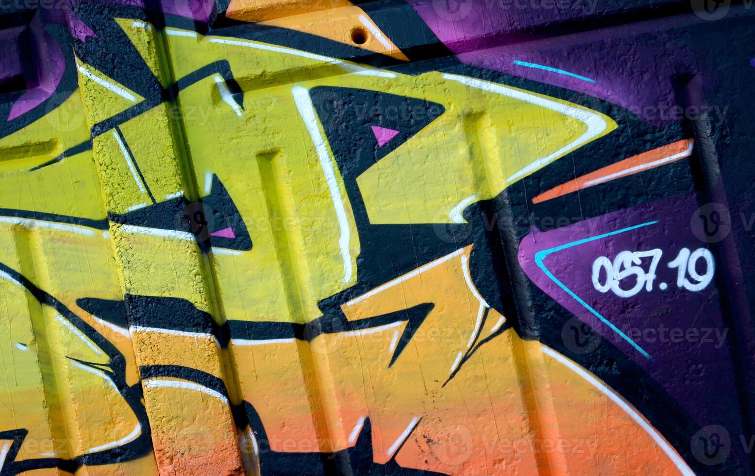 Colorful background of graffiti painting artwork with bright aerosol outlines on wall. Old school street art piece made with aerosol spray paint cans. Contemporary youth culture photo
